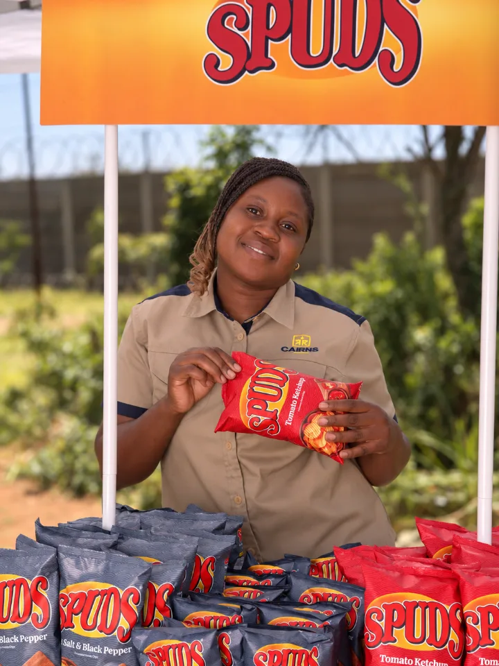 Cairns Foods team member with Spuds